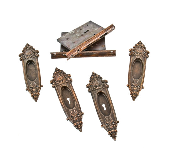original late 19th or early 20th century american victorian era copper-plated iron "anjou" pattern residential pocket door hardware