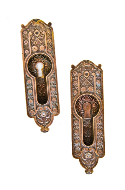matching set of original highly desirable ornamental cast bronze "rope" pattern interior residential pocket door escutcheons