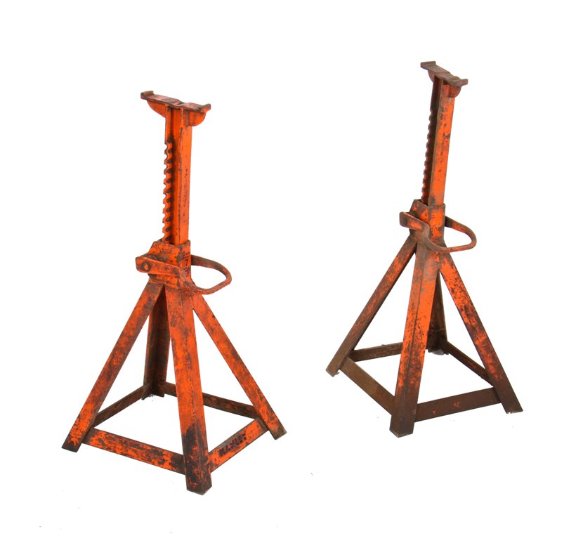 matching set of american vintage industrial stationary weathered and worn orange enameled steel rack and pinion jacks