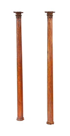 late 19th century original and largely intact solid varnished mahogany wood fluted and tapered freestanding residential columns with gesso ornament