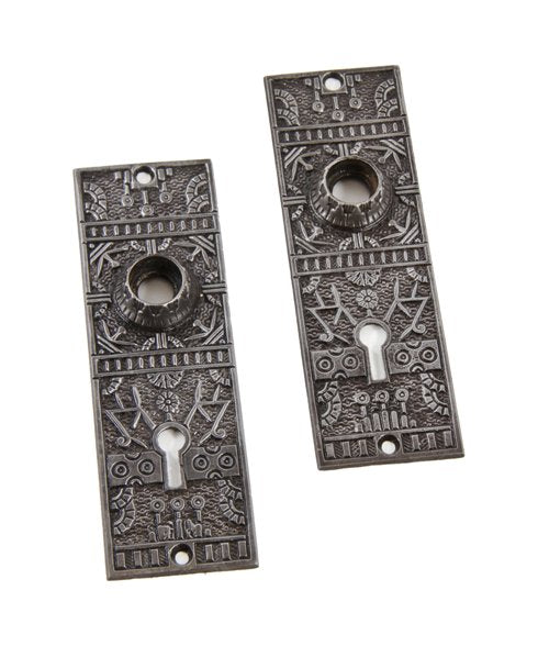 two matching late 19th century original antique american ornamental cast iron "windsor" pattern residential passage door backplates