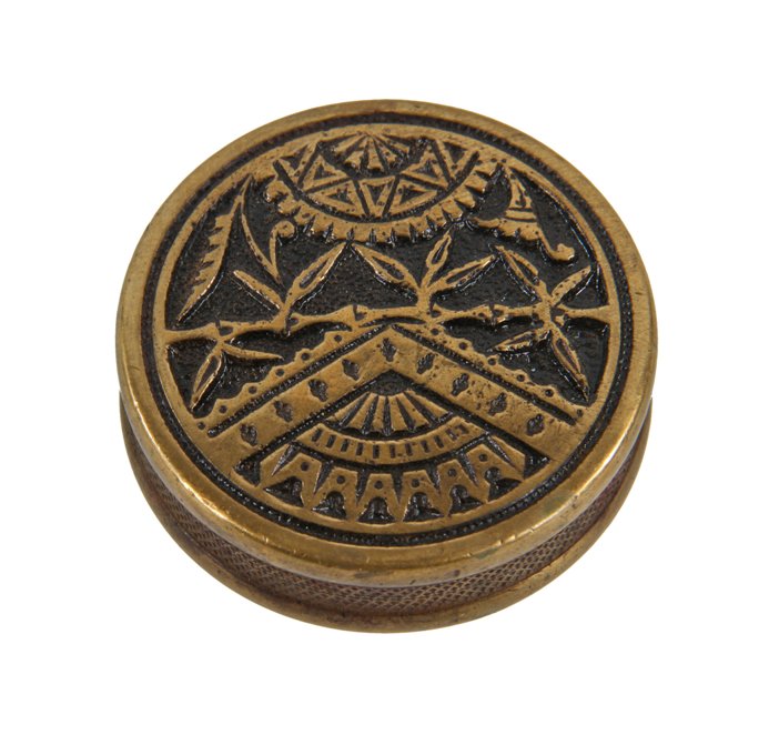 single 19th century ornamental cast brass drum-shaped "bamboo" pattern eastlake style doorknob with baked black enameled inlay