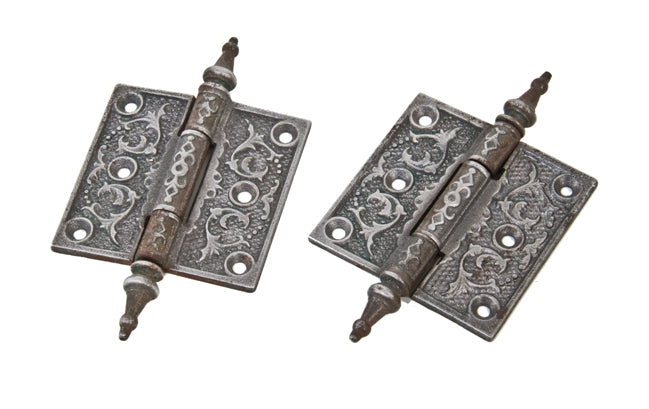matching pair of original 19th century interior residential ornamental cast iron passage door loose pin hinges with steeple finials