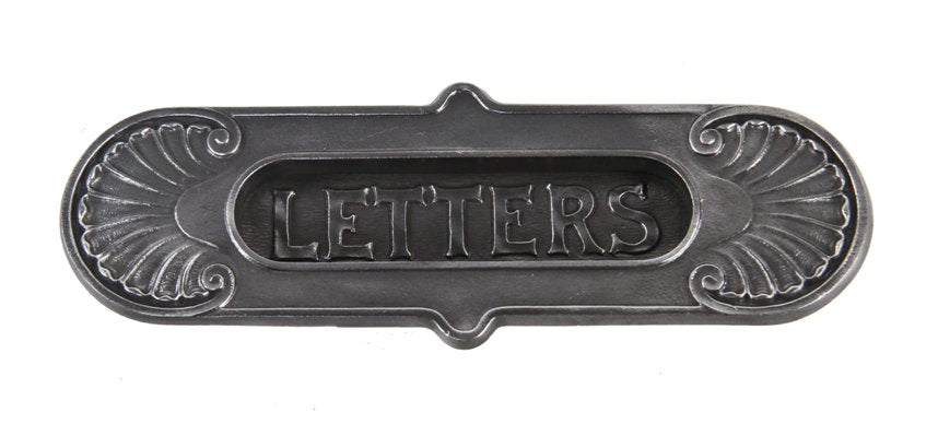 original early 20th century neoclassical style ornamental cast iron "letters" hinged mail slot featuring deeply grooved seashell design motifs
