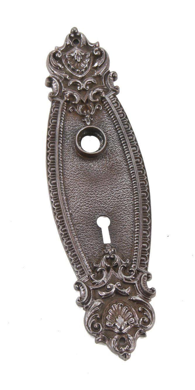 refinished c. 1900's original antique ornamental cast iron interior residential doorknob backplate with anthemions and egg & dart border