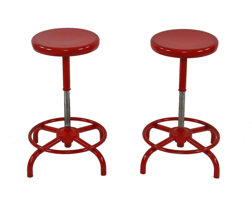 matching set of original fully adjustable cherry red enameled tubular steel four-legged stationary stools with revolving seats
