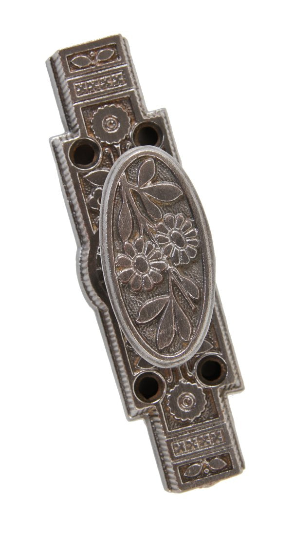 original 19th century antique american aesthetic movement ornamental cast iron french door cremone bolt handle with elongated oval-shaped rotating knob