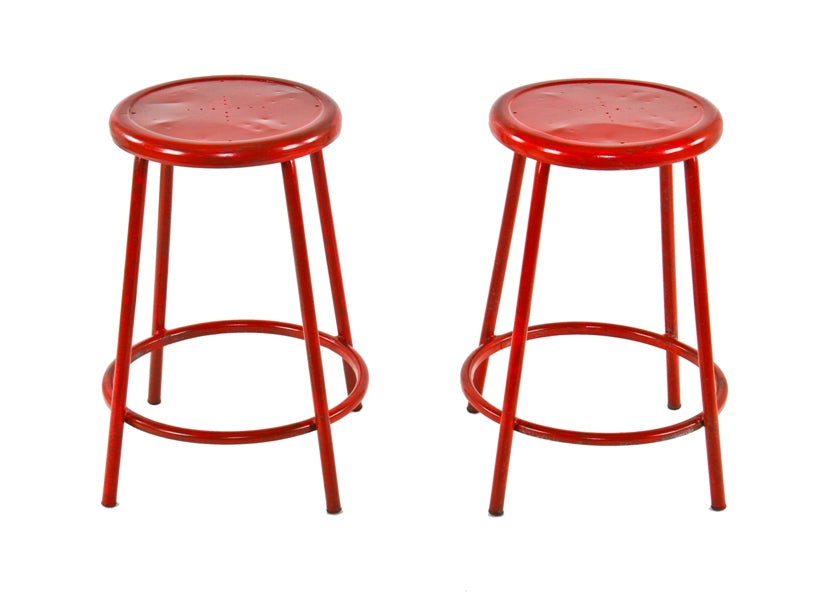 group of two matching late 1940's vintage american industrial bright red enameled pressed and folded steel four-legged stools
