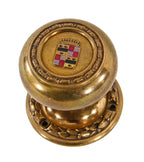 original c. 1920's american ornamental cast bronze emblematic downtown detroit book cadillac hotel guest room doorknob with matching rosette