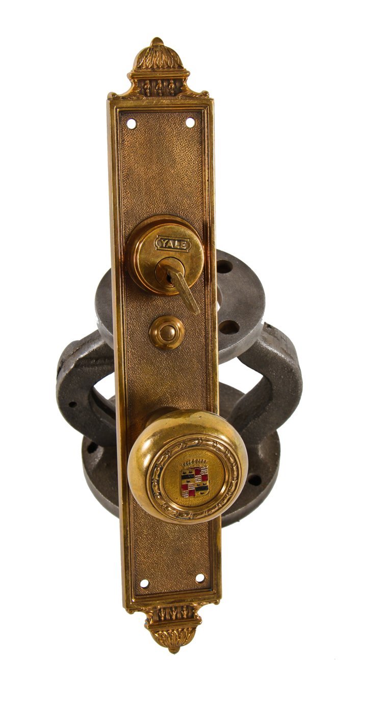 c. 1920's nicely patinated matching decorative cast bronze historic book cadillac hotel building guest room doorknob with matching backplate