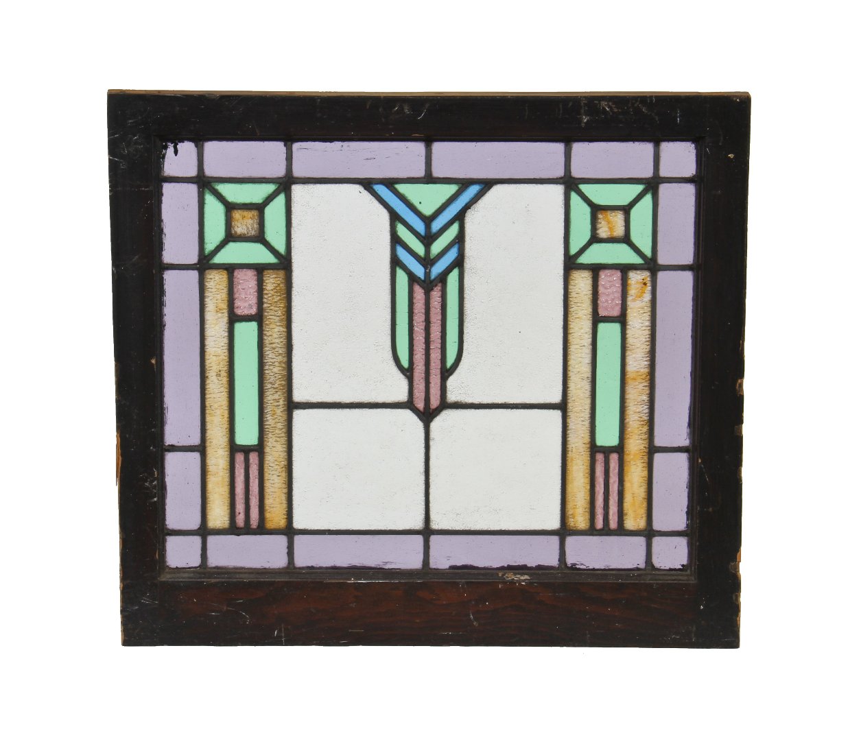 original and intact early 20th century interior residential craftsman style stained glass window featuring a centrally located chevron motif