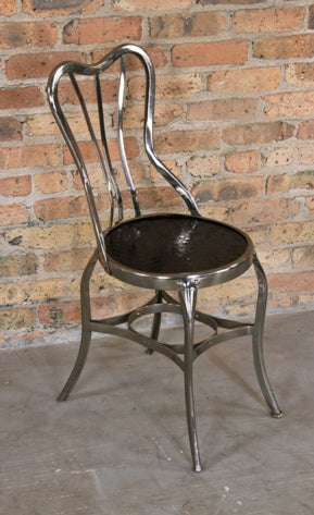 original c. early 20th century antique american uhl art steel foour-legged fanciful pressed and folded chrome plated steel "perfection" chair