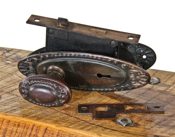 early 20th century original chicago graystone interior passage door ornamented wrought steel door hardware with nicely aged surface patina