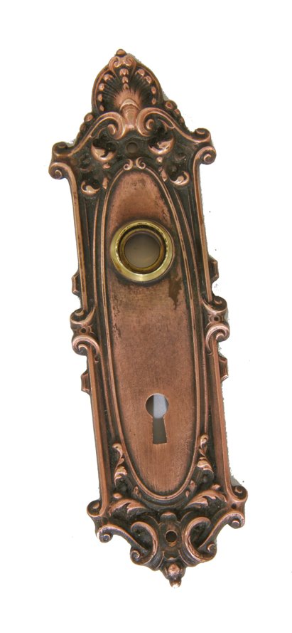 early 20th century antique american ornamental cast bronze "largo" pattern interior residential passage door backplate with brass thimble