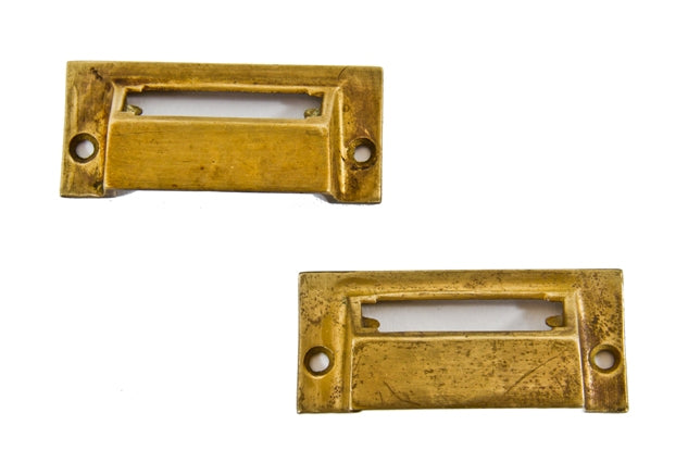 pair of matching early 20th century american drugstore "garcy" cast yellow brass cabinet drawer or bin pulls with slots for placards