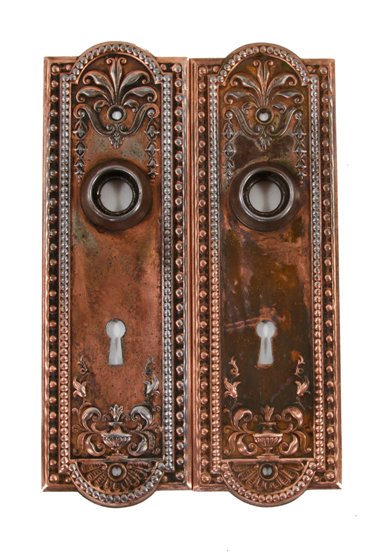 pair of original c. 1900's antique american decorative copper-plated wrought steel "como" pattern passage door backplates
