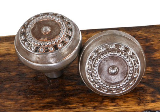 original early 20th century antique american ornamental wrought steel "como" pattern passage size doorknobs with banded rims