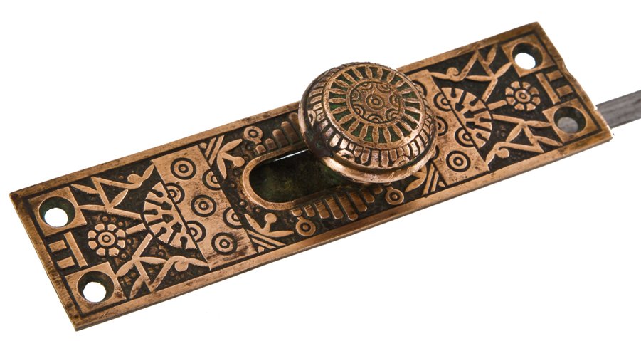 seldom found original and intact american eastlake style "windsor" pattern residential entrance door flush mount sliding door bolt