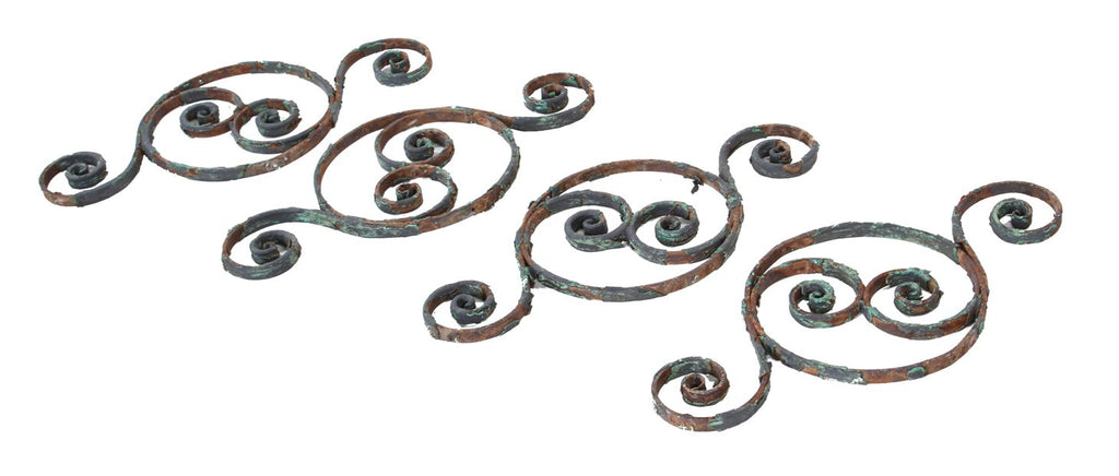four original 19th century american victorian era hand forged ornamental wrought iron exterior stair balusters with fishtail scrolls