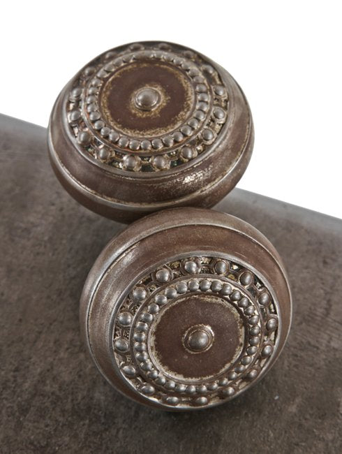 two original passage size interior residential "como" pattern ornamental wrought steel antique doorknobs with beaded borders