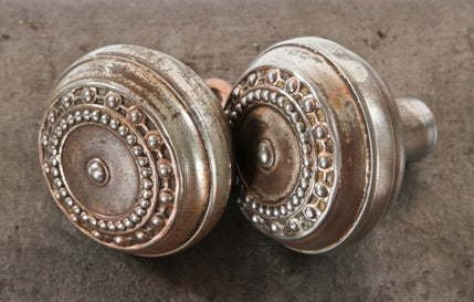 two matching wrought ornamental steel "como" pattern interior residential passage size doorknob with beaded borders