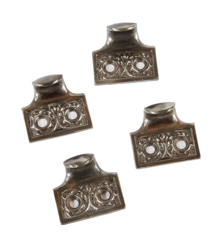 four matching 19th century original ornamental cast iron antique american residential window sash pulls or finger lifts