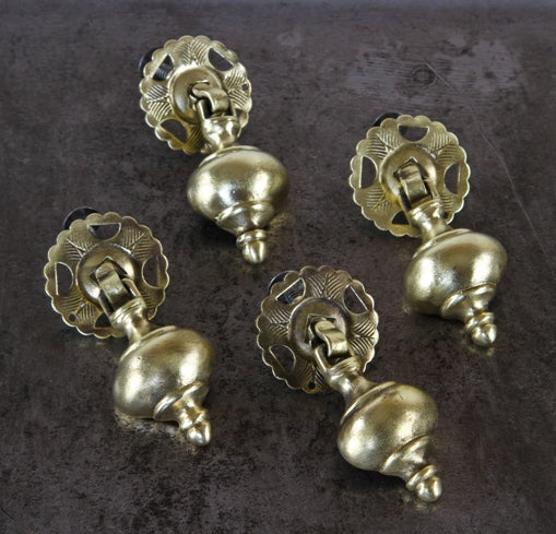 set of four c. 1920's american ornamental cast brass "teardrop" furniture cabinet drawer pulls with intact perforated backplates