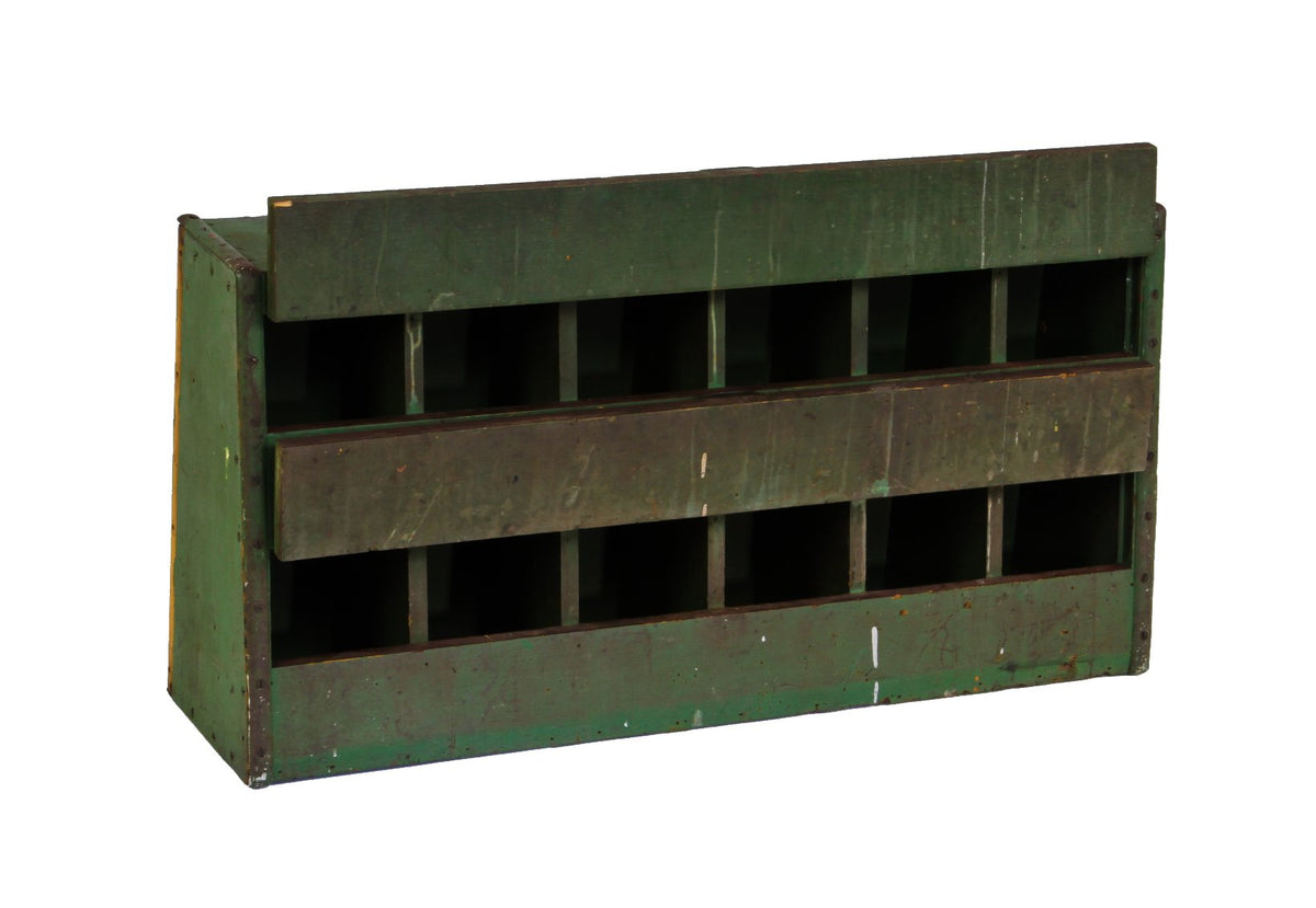 unrestored late 1920's custom-built painted green pine wood angled front cubby hole machine shop cabinet with butterfly hinged doors