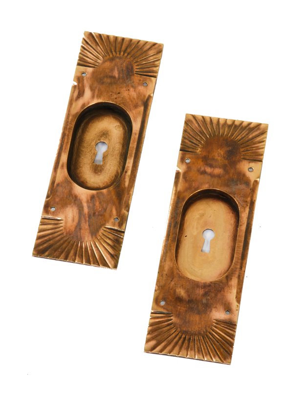 two matching original late 19th century decorative cast bronze "falmouth" pattern interior residential sliding door backplates
