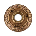 single c. 1920's antique american ornamental cast bronze interior guest room door doorknob rosette with a bayleaf motif border