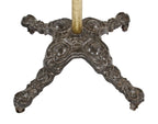 hard to find and highly desirable early 20th century completely intact clothing store garment rack with a heavily ornamented cast iron weighted base