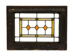 single diminutive c. 1920's original american antique prairie school style chicago bungalow residential transom window with amber diamonds