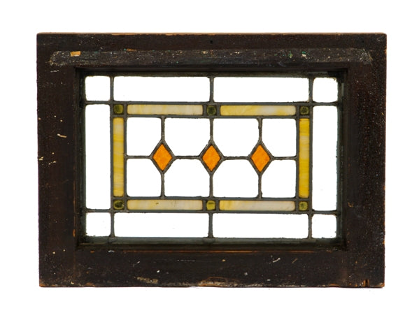 single diminutive c. 1920's original american antique prairie school style chicago bungalow residential transom window with amber diamonds
