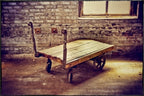 original late 19th century structurally sound and stable solid oak wood and cast iron towsley factory furniture cart or truck with sanded and sealed finish