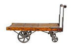 c. 1890's american antique industrial refinished burhop factory floor cart or truck with oversized cast iron wheels