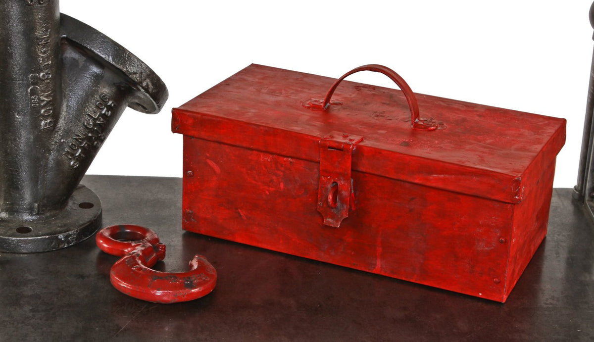 riveted joint distressed red painted all-metal hinged top portable tool chest or box with a lockable hasp and custom-built stationary handle