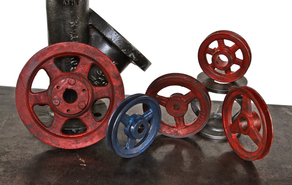 assortment of old american industrial painted cast iron and steel factory machine shop "browning" belt sheaves and gears