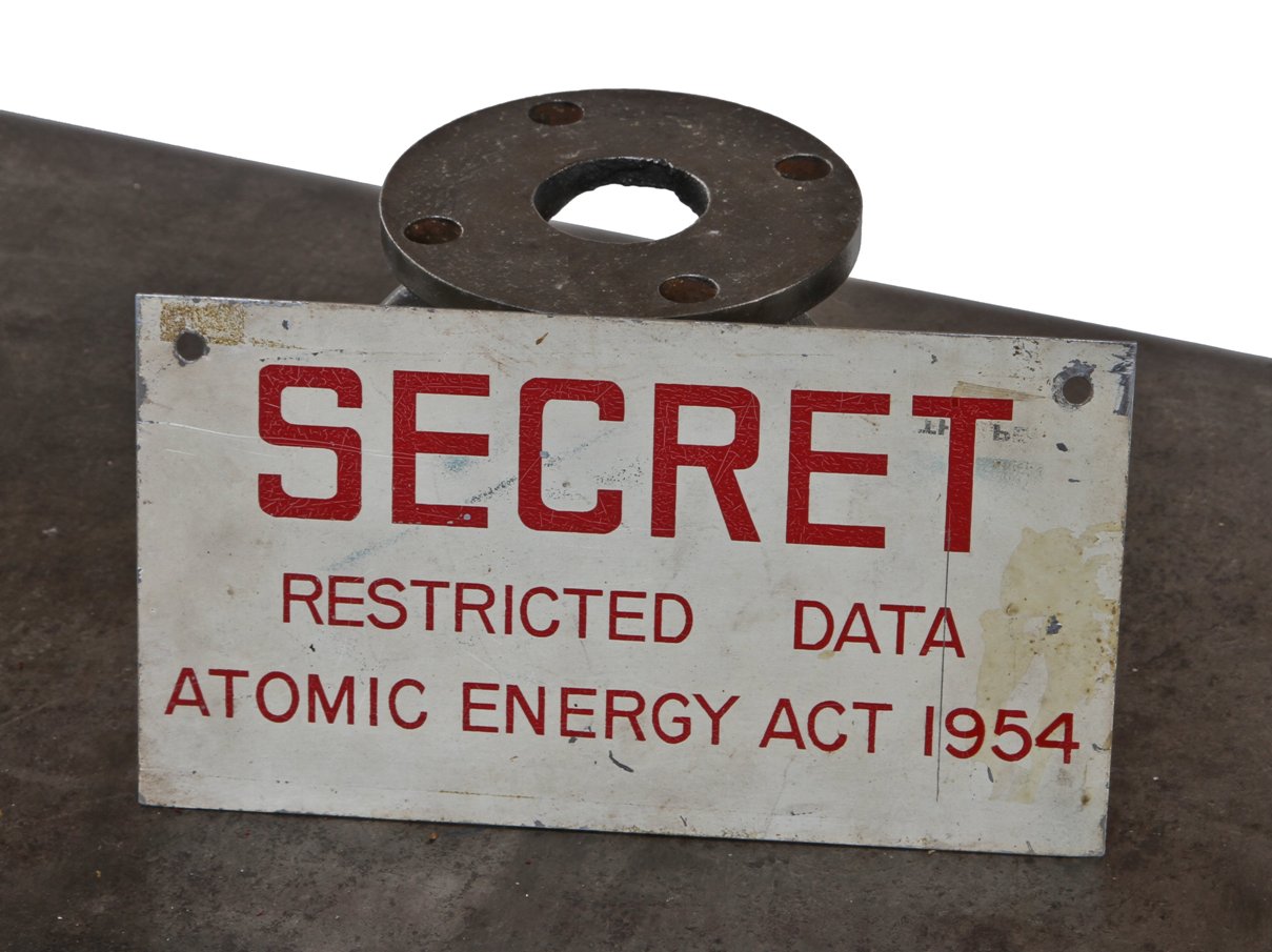original c. 1950's atomic-era single-sided die cut enameled steel los alamos laboratory "secret" informational sign with cherry red lettering