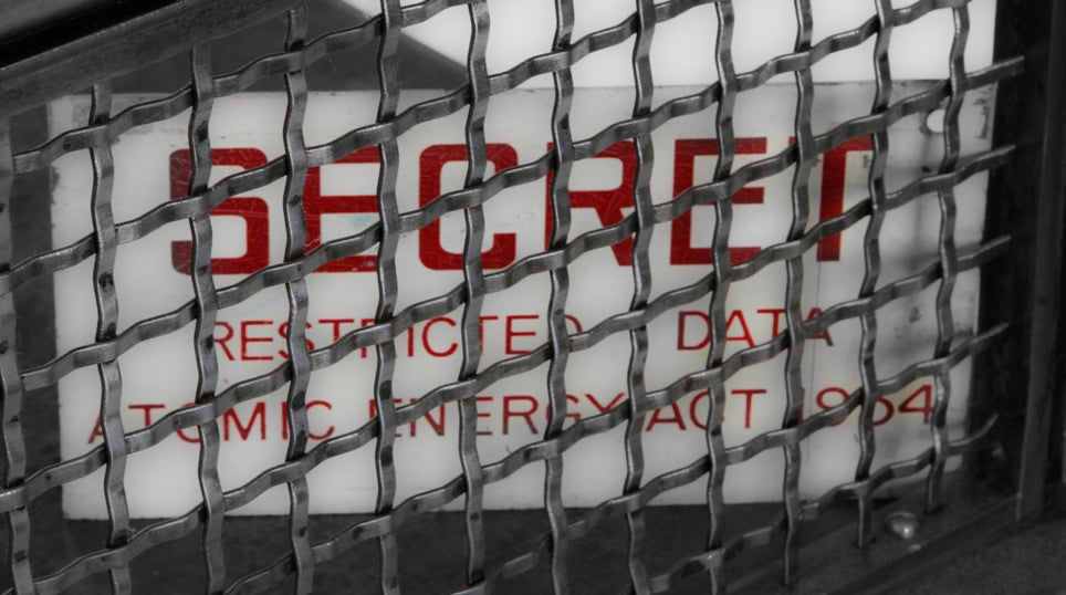 original c. 1950's atomic-era single-sided die cut enameled steel los alamos laboratory "secret" informational sign with cherry red lettering