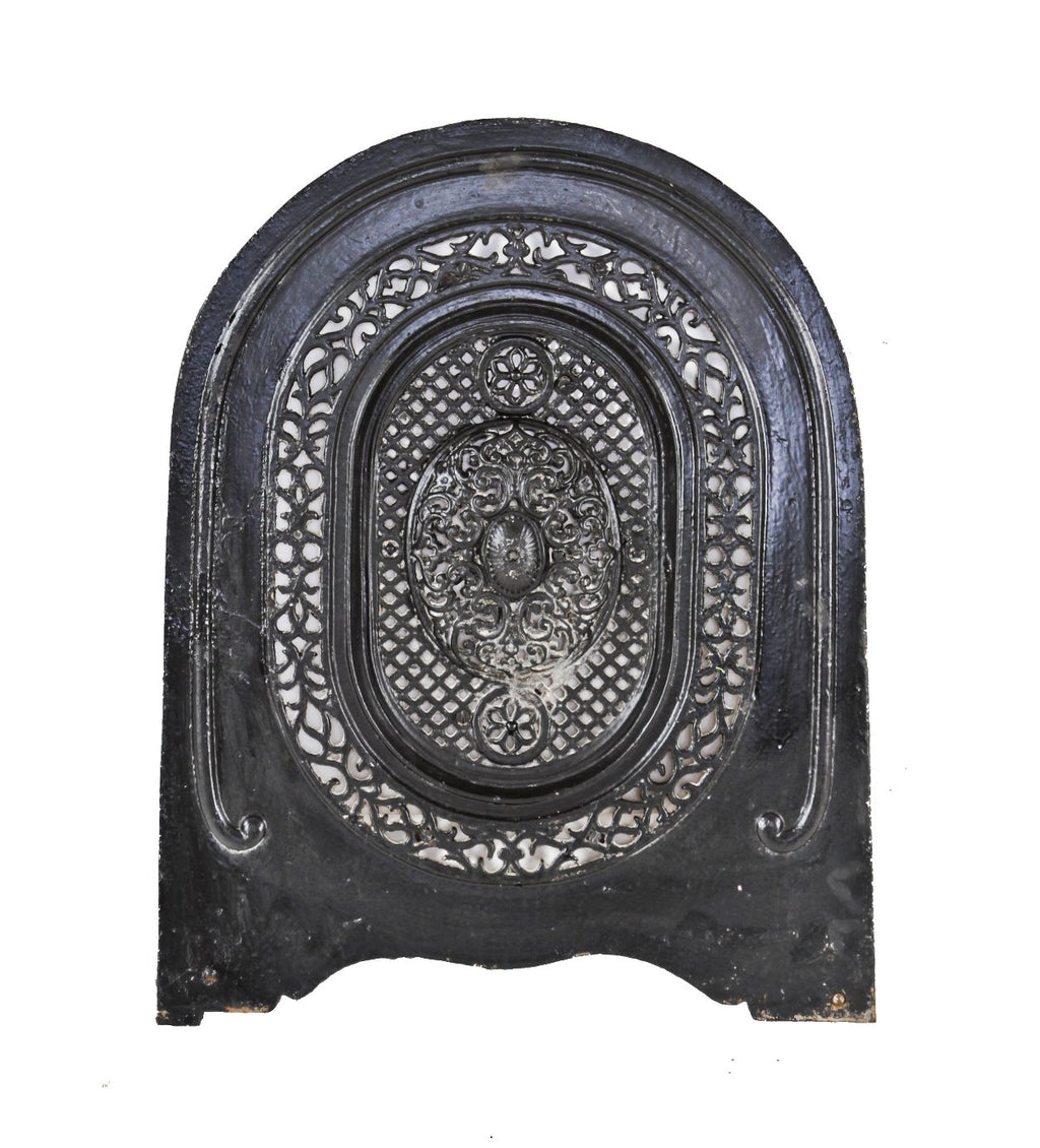 original 19th century black enameled ornamental cast iron arch top interior residential chicago italianate fireplace summer cover