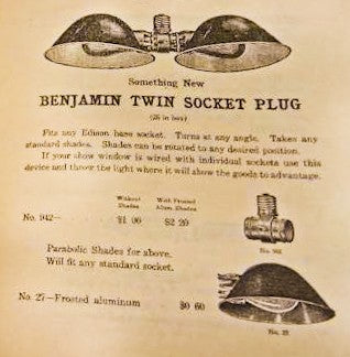 sought after original early 20th century american industrial yellow brass "benjamin" double plug cluster lamp socket adapter with nicely aged surface patina.