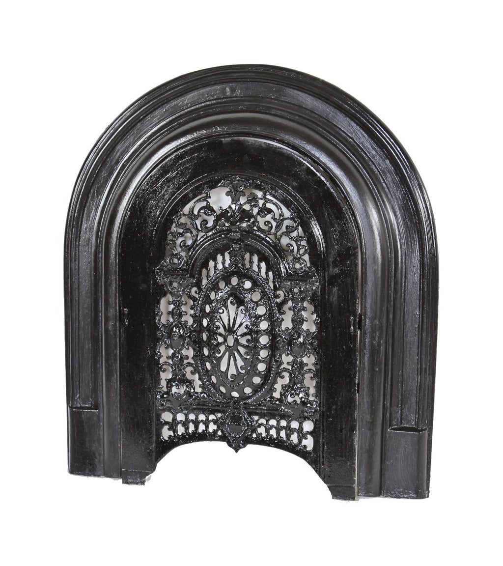 completely intact late 1860's interior chicago italianate black enameled cast iron arch top summer cover with original surround
