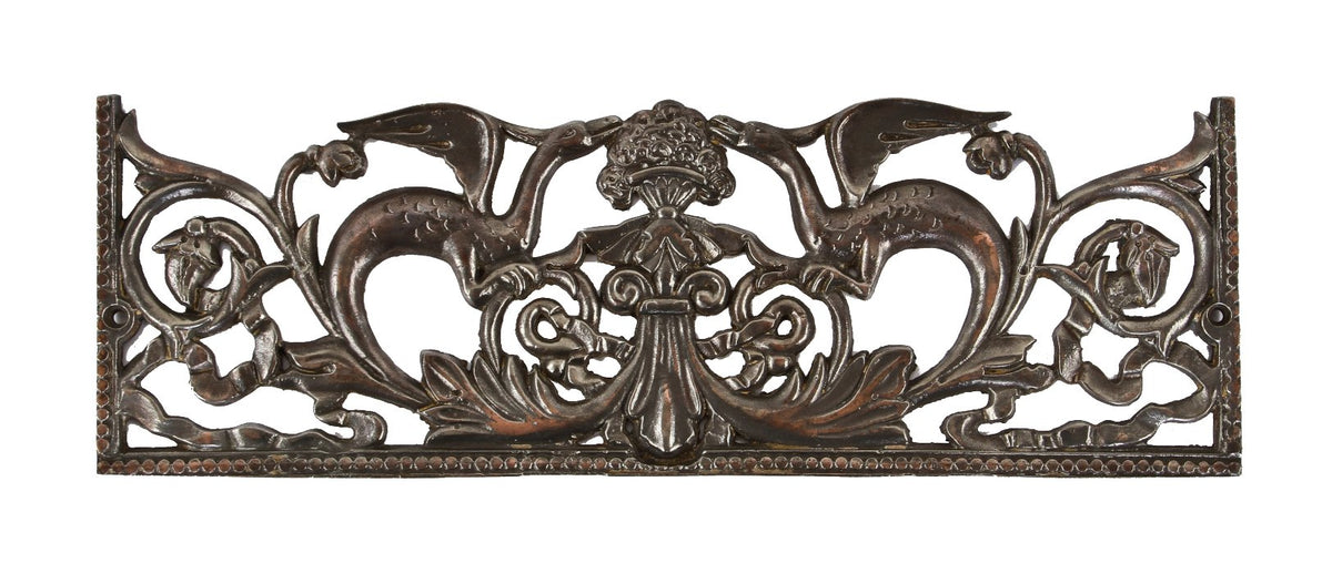 visually striking late 19th century refinished ornamental cast iron interior residential fireplace gas insert grate or guard with winged dragons
