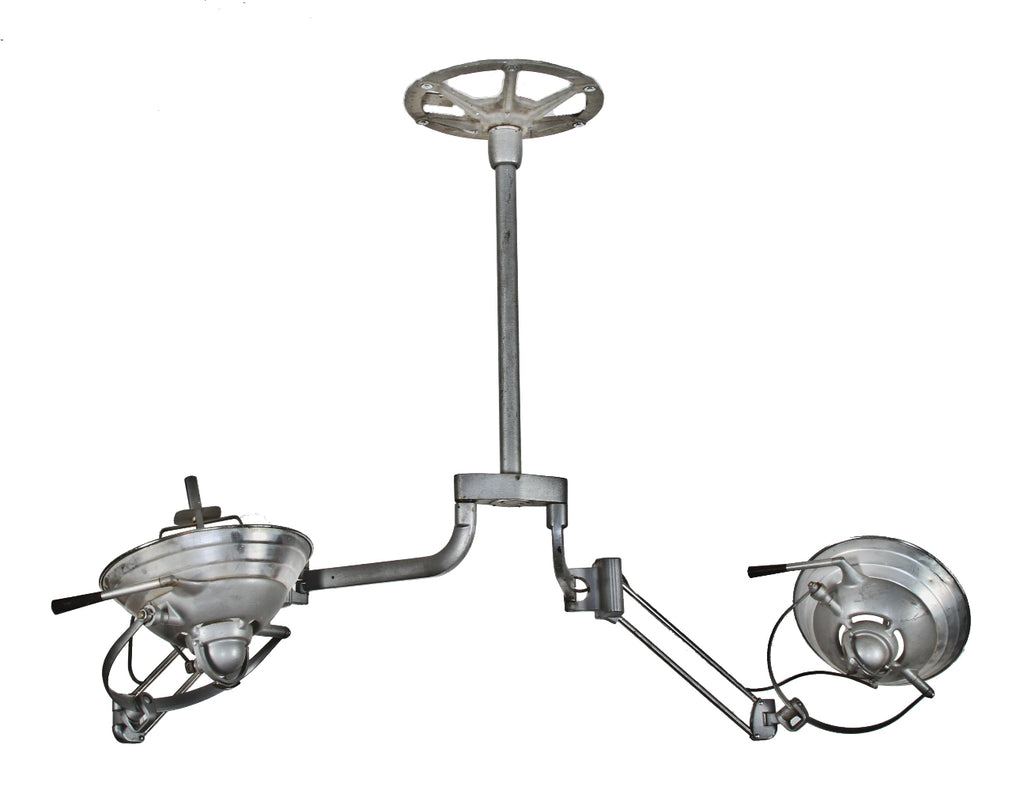 fully functional vintage american medical dual arm hospital operating room ceiling-mount surgical lamp with "stepped" dome-shaped lampheads