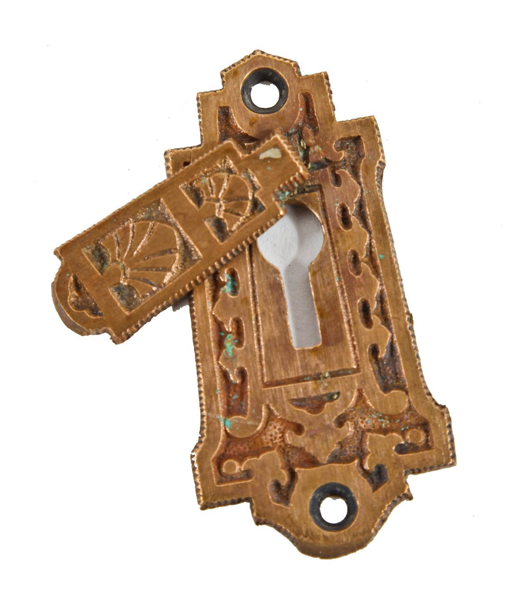 decorative 19th century antique american interior residential passage door keyplate or escutcheon with swinging keyhole cover