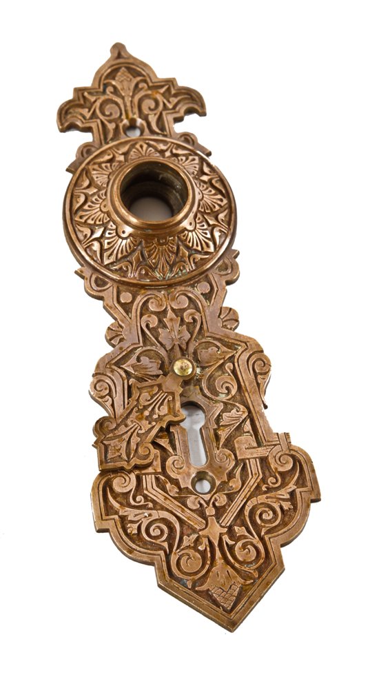 well-maintained original c. 1880's ornamental cast bronze interior residential oversized doorknob backplate with swinging keyhole cover