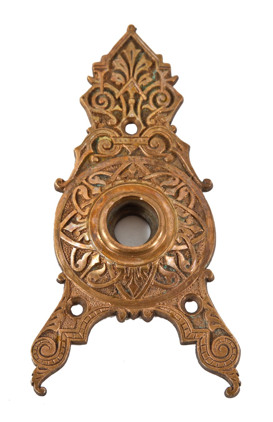 early 1880's antique american victorian era ornamental cast bronze interior residential oversized triangular-shaped doorknob backplate