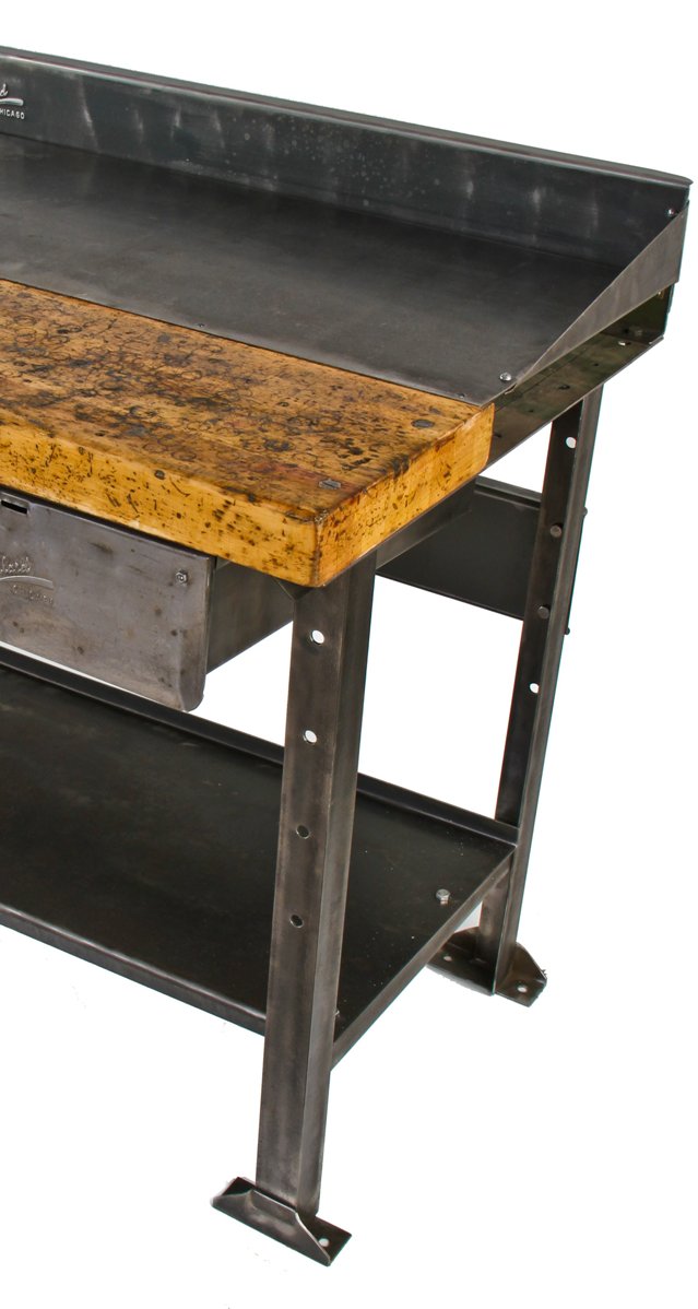 original heavy duty late 1930's american industrial angled iron factory workbench with combination maple and steel tabletop