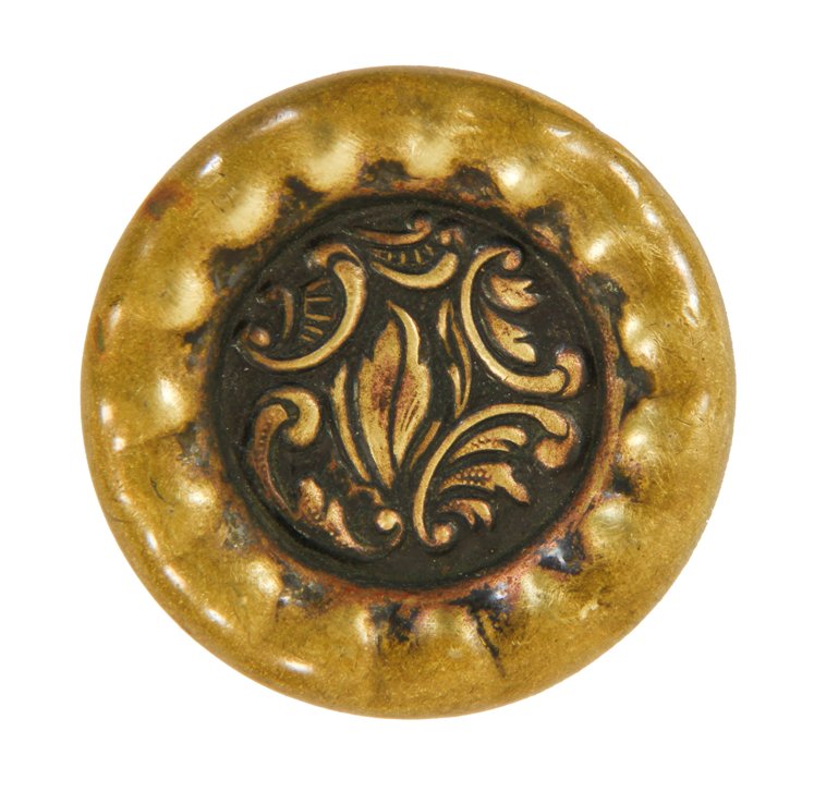 single late 19th or early 20th century ornamental wrought brass "eulalia" pattern passage size doorknob with sunken center