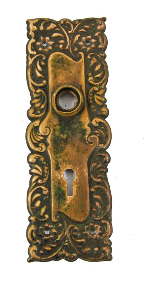 single early 20th century nicely aged interior residential passage door "eulalia" pattern wrought bronze doorknob backplate